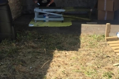 painting-the-stands-for-the-hives
